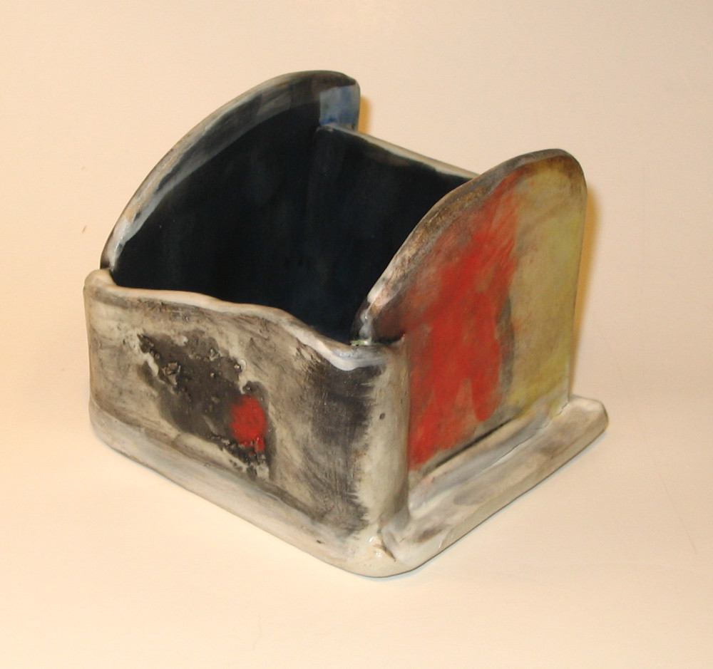 Small open box with texture and soft underglaze.