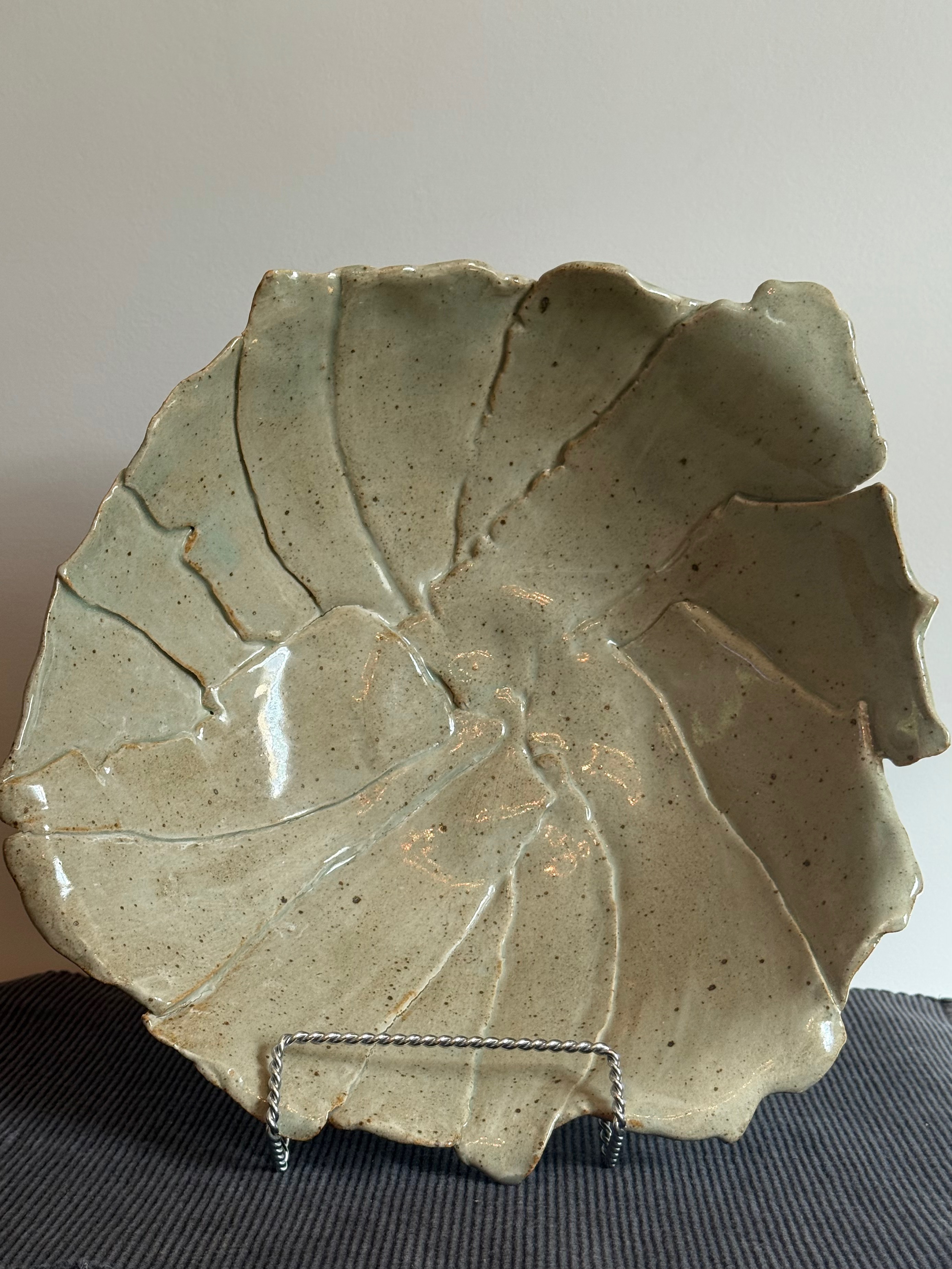 Bowl done in torn pieces of white clay covered in Sage glaze.