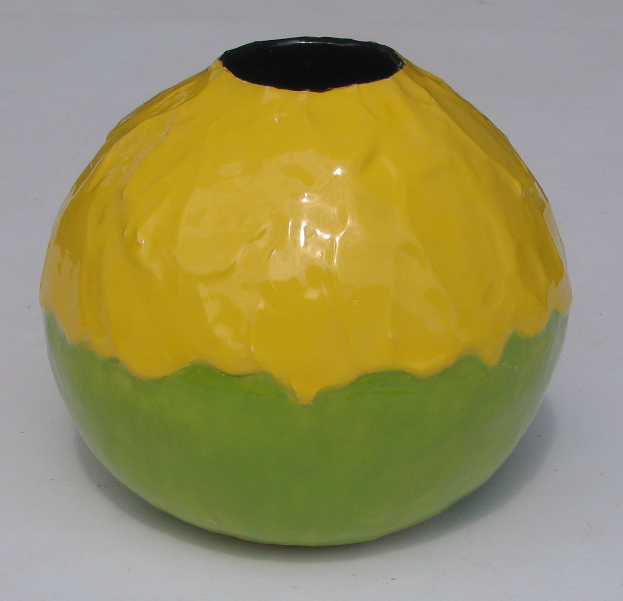 Sunflower-like vessel with black interior
